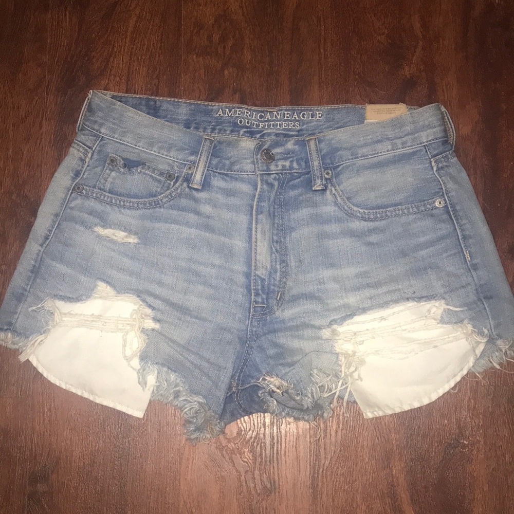 Distressed denim shorts